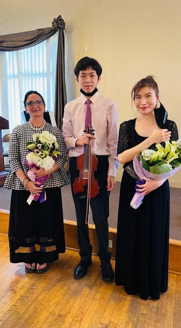 Picture with violin teacher (left) and piano accompanist (right)